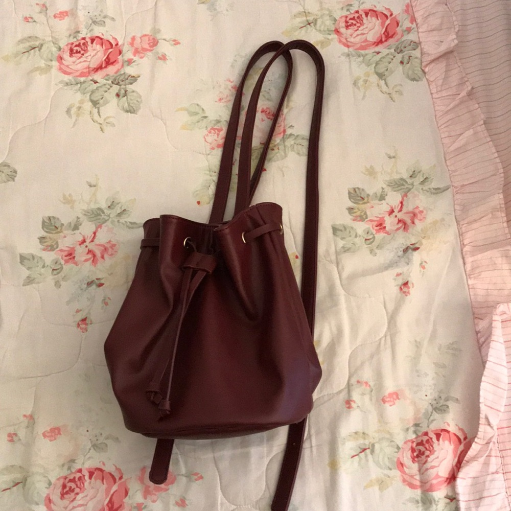F21 burgundy mini backpack